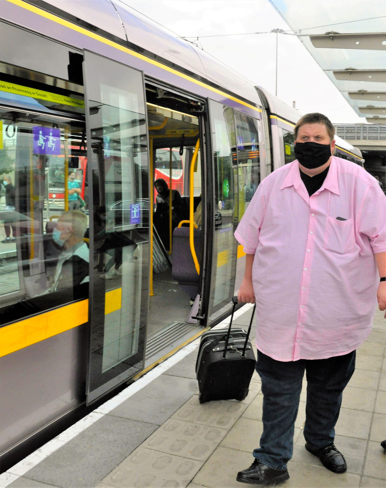 Ireland Man Train Irish man waiting to board a train
